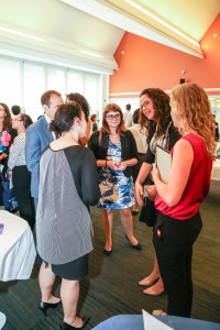 People talking at 3rd Annual Externship Expo