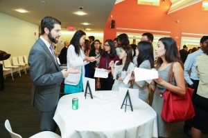 People talking at 3rd Annual Externship Expo