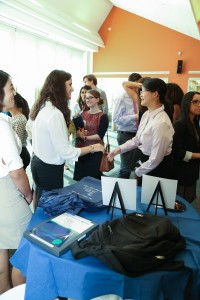 People talking at 3rd Annual Externship Expo
