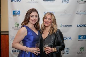 faculty and studnet pose at the Eyeball 2016 party