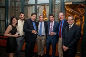 faculty, staff and studnets pose at the Eyeball 2016 party