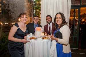 Optometry staff pose at the Eyeball 2016 party