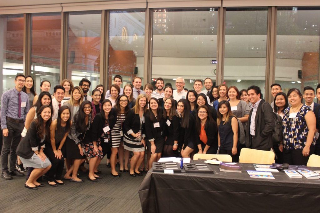 Group of Students smiling for picture at networking event