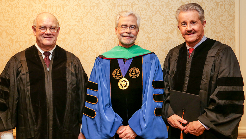 Dr. Paul Sieving, President David A. Heath, and Dr. Max Gomez