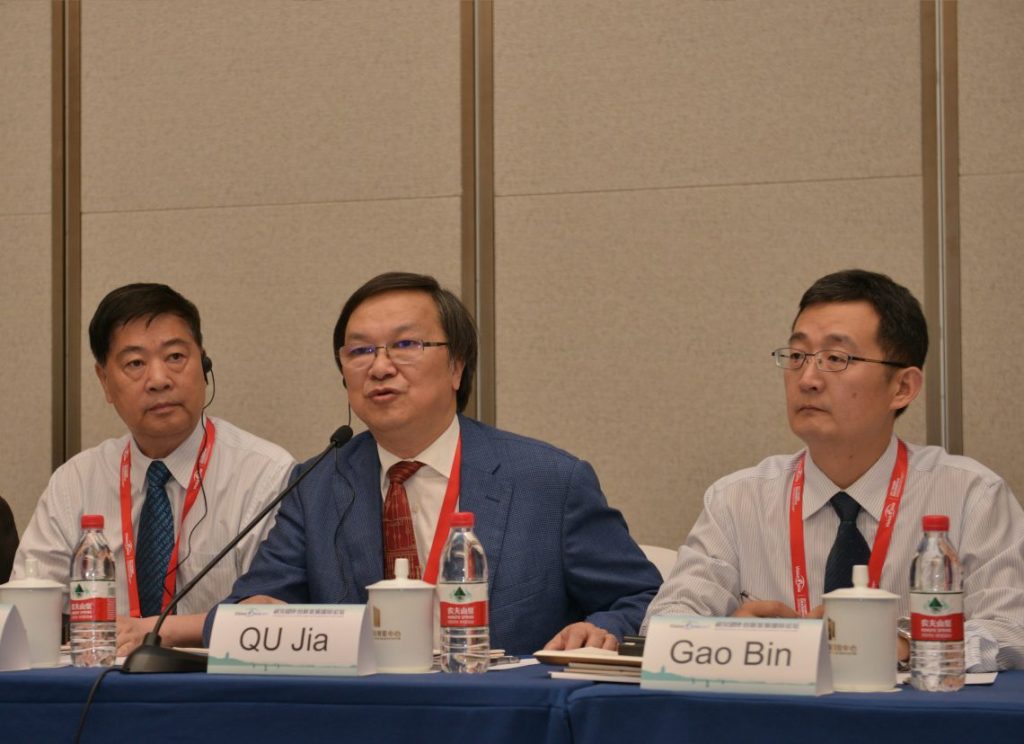 People at table with microphone