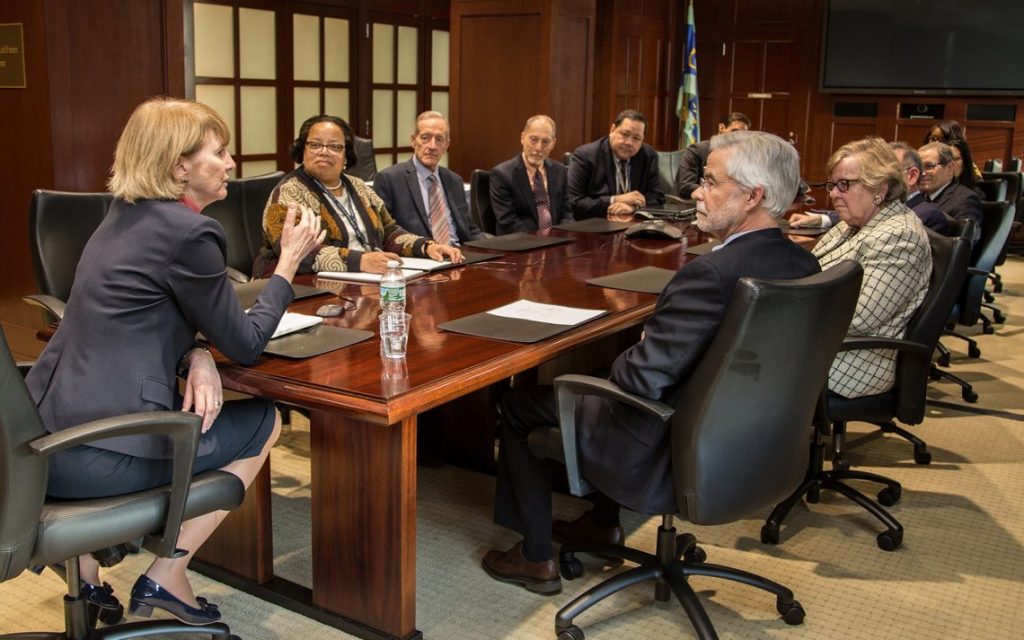 People at conference room table