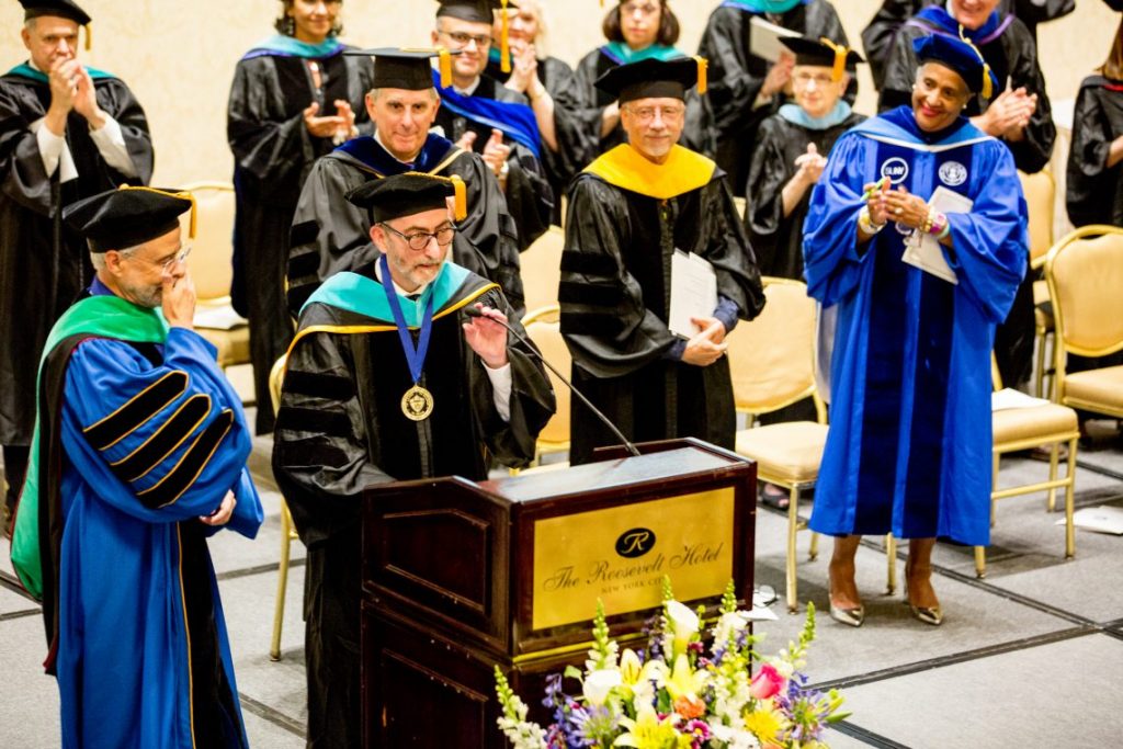 Speaker at podium