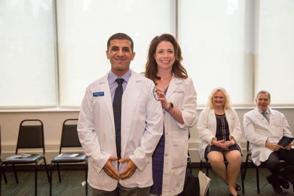Students with white coats