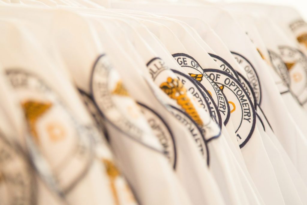 White coats with patches